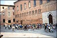 Children's bike race gathering in the square before the Duomo :: Siena, Italy