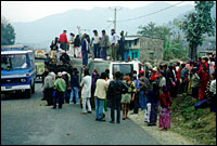 One reason to take a tourist bus: Overturned (public) bus on the way to Pokhara :: Nepal