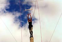 Ropes course in Taupo - jumping for the trapeze from a pole 30 meters high.